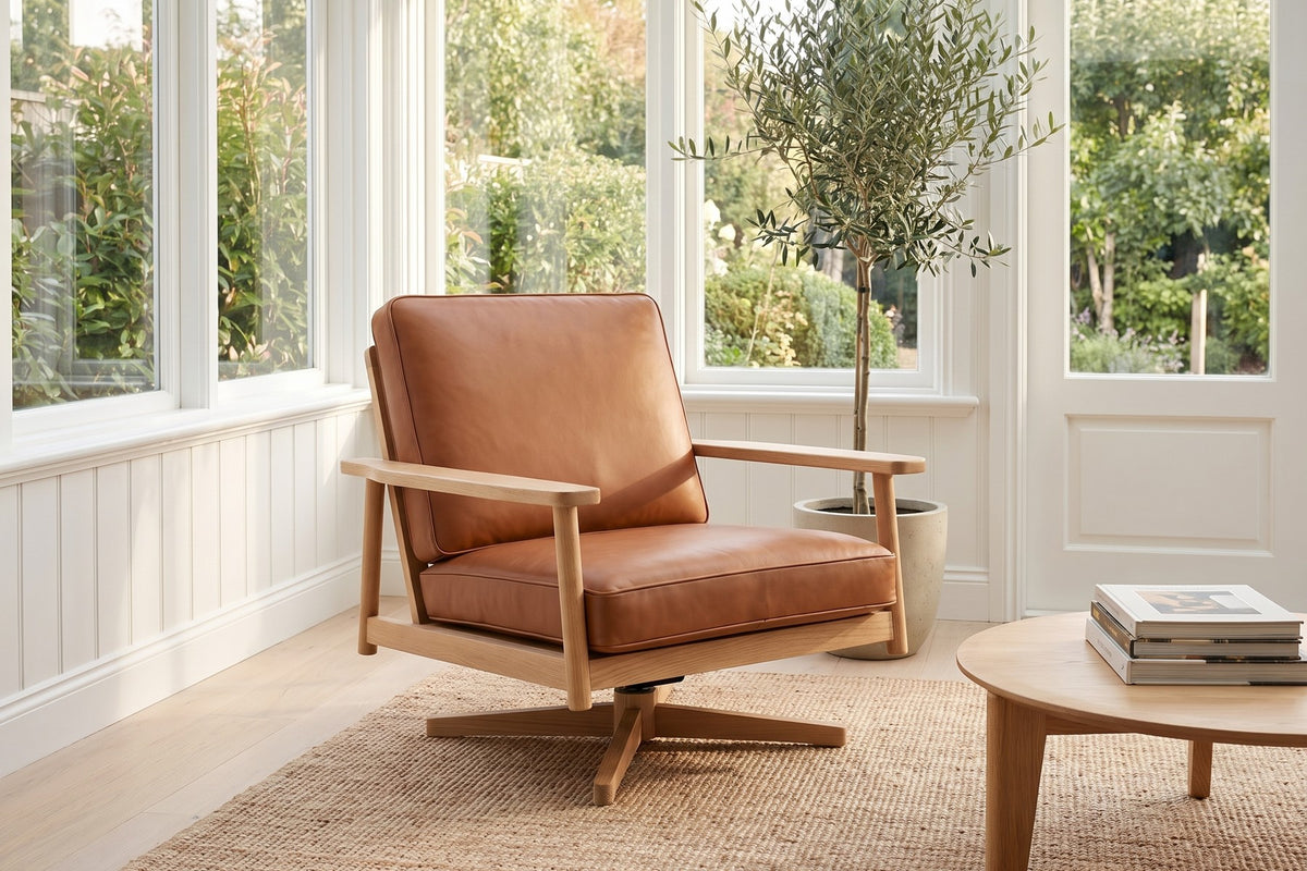 Chinon Cognac Leather and Oak Swivel Chair in a room