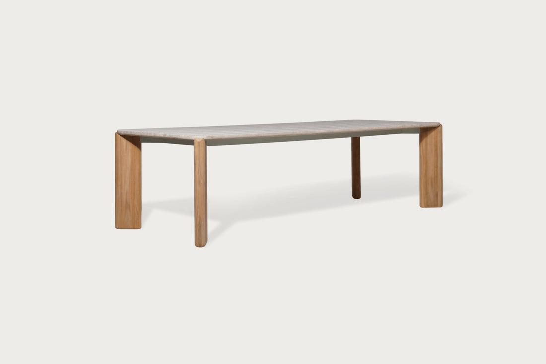 Freya Outdoor Teak Dining Table on a patio