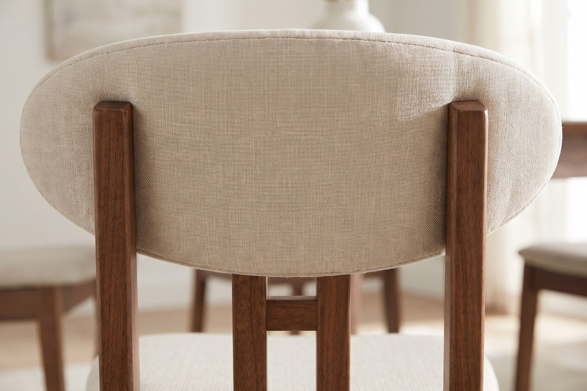 Close-up of the two walnut-finish back posts meeting the beige oval backrest (Adèle)