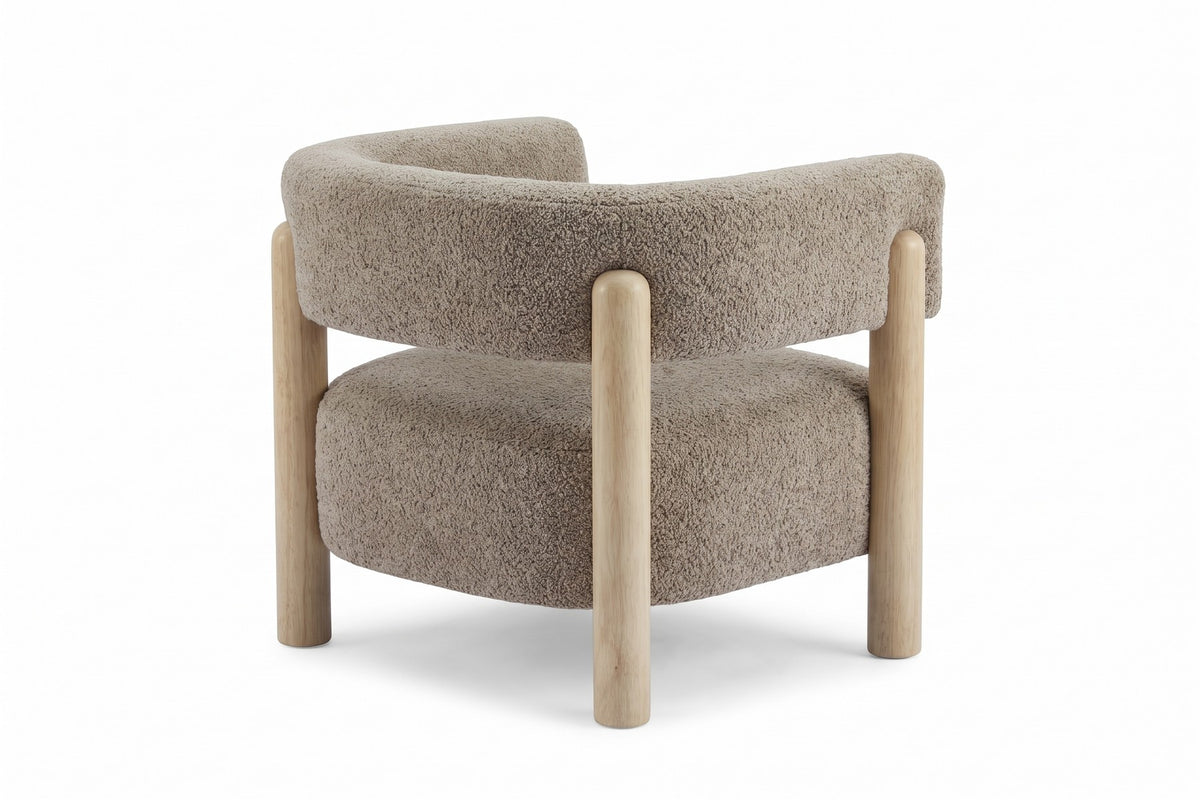 Agathe light camel bouclé barrel accent chair with natural wood legs, back three-quarter view on a white background