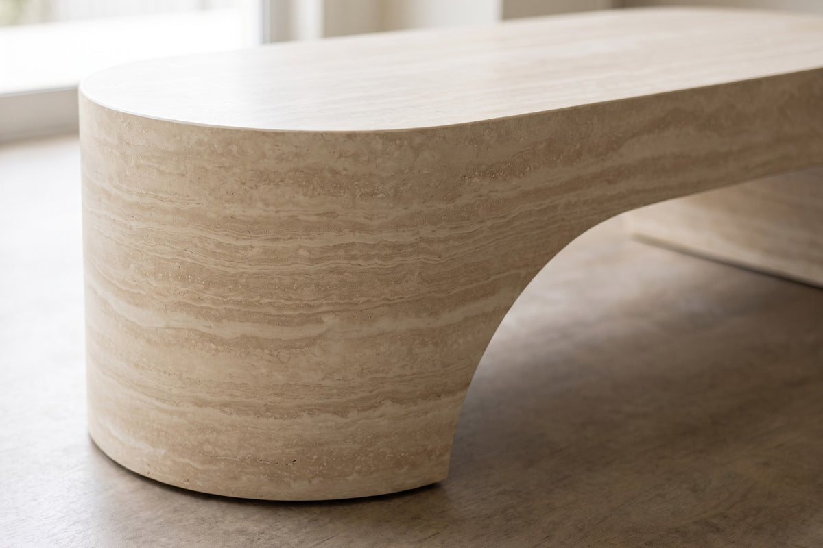 Alma Oval Sculpted Coffee Table – Travertine-Look Fiberglass, 43"