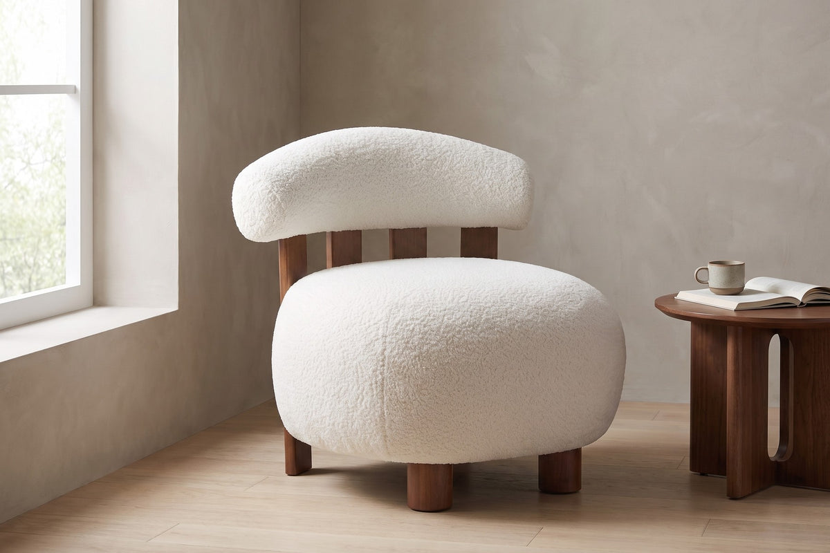 Daylight. Armless and compact, it slips into a window corner beside a small side table.