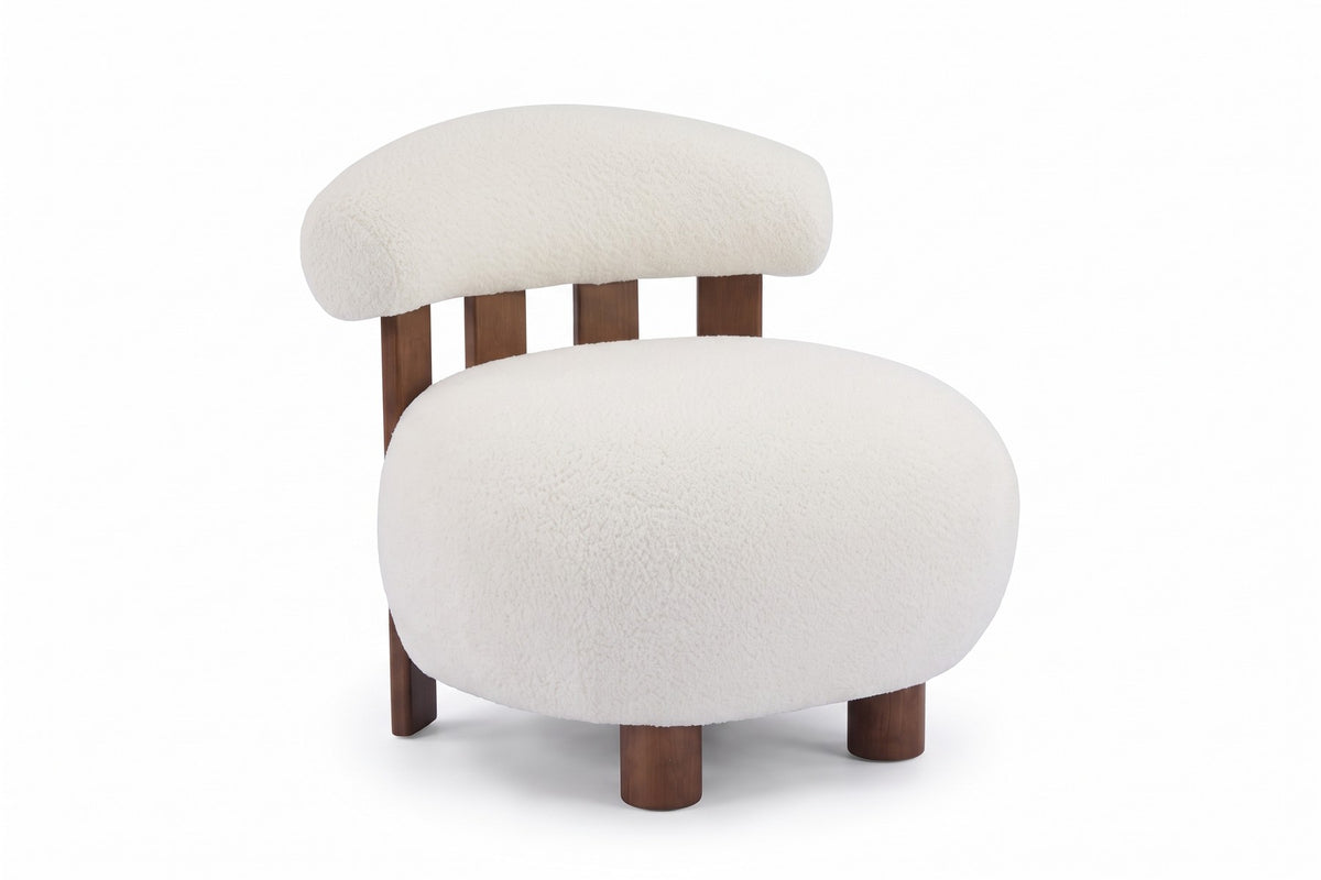 Anouk off-white bouclé slipper chair with a walnut-finish slatted back, three-quarter front view on a white background
