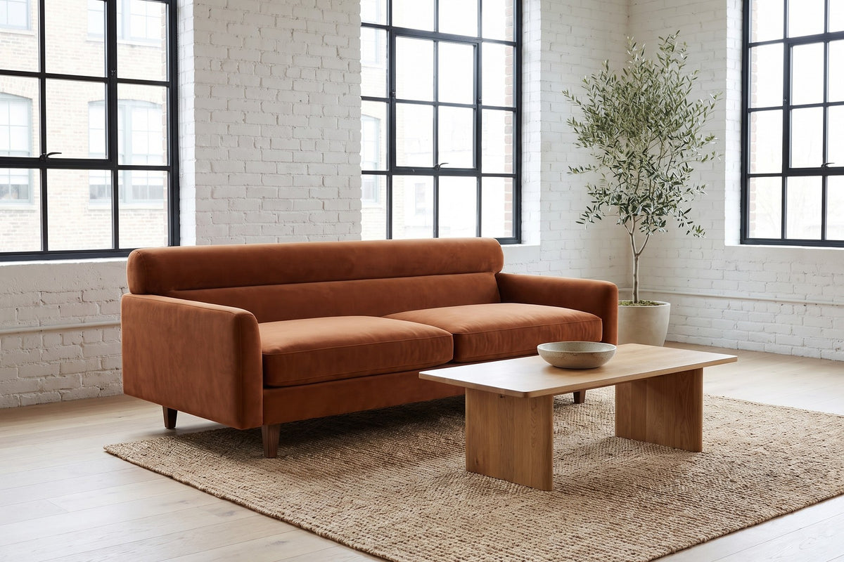 Antibes Cognac Velvet Sofa styled in a room