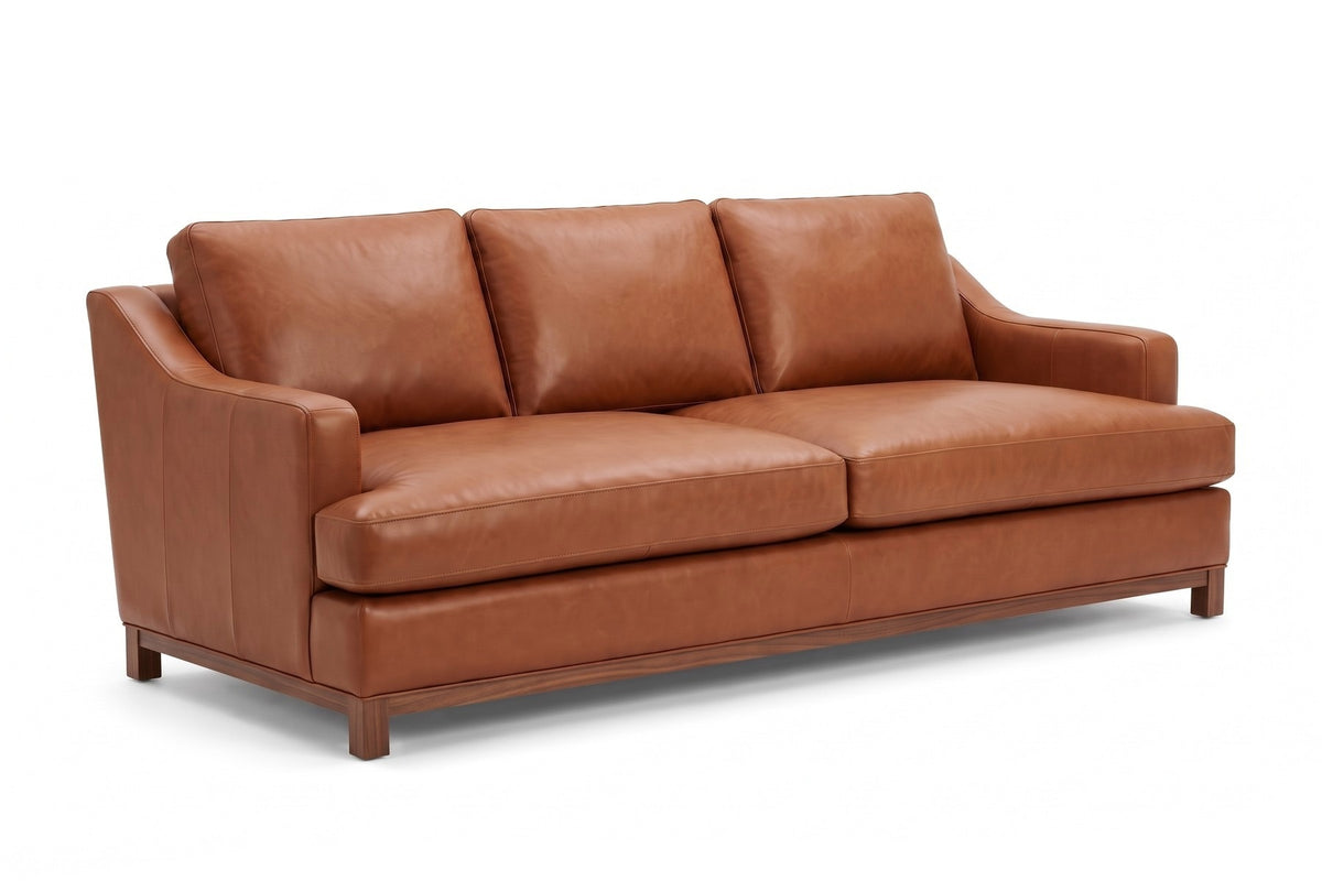 Arcachon Cognac Deep Leather Sofa, three-quarter view from the front left, slightly above seat height