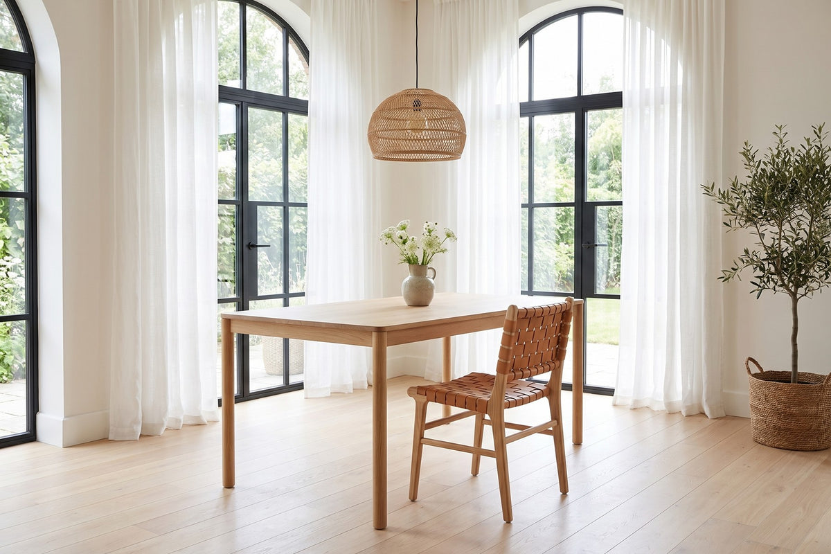 Arles Woven Leather Dining Chair in a room