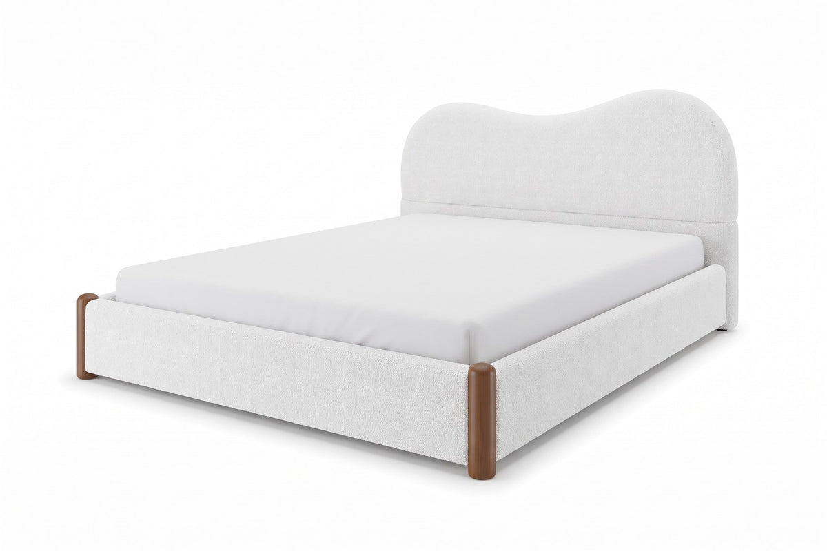 Aurore white Berber fleece king bed with a wavy headboard and walnut-finish feet, three-quarter front view from slightly above on a white background