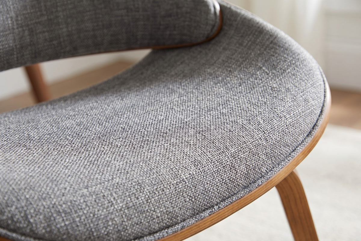 Close-up of the grey woven fabric on the seat cushion