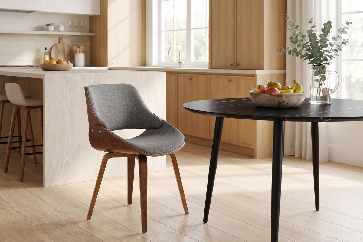 Daylight in the kitchen. The scooped seat is ready for a slow breakfast at a round table.