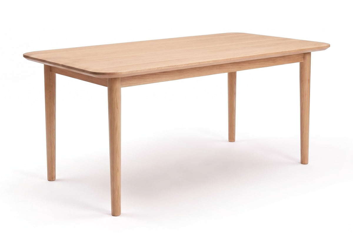 Beaune Dining Table in Natural Oak, three-quarter view on white