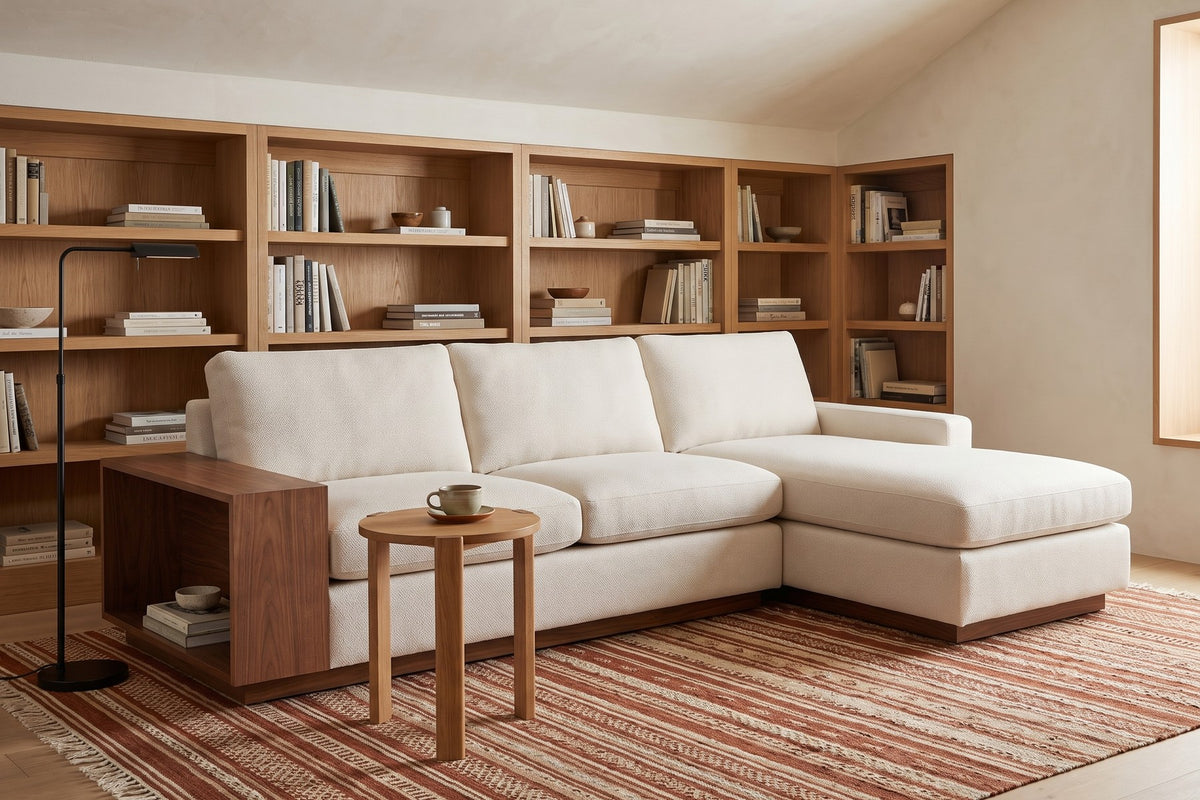 Biarritz Ivory Low Chaise Sectional with Walnut Side Table in a home