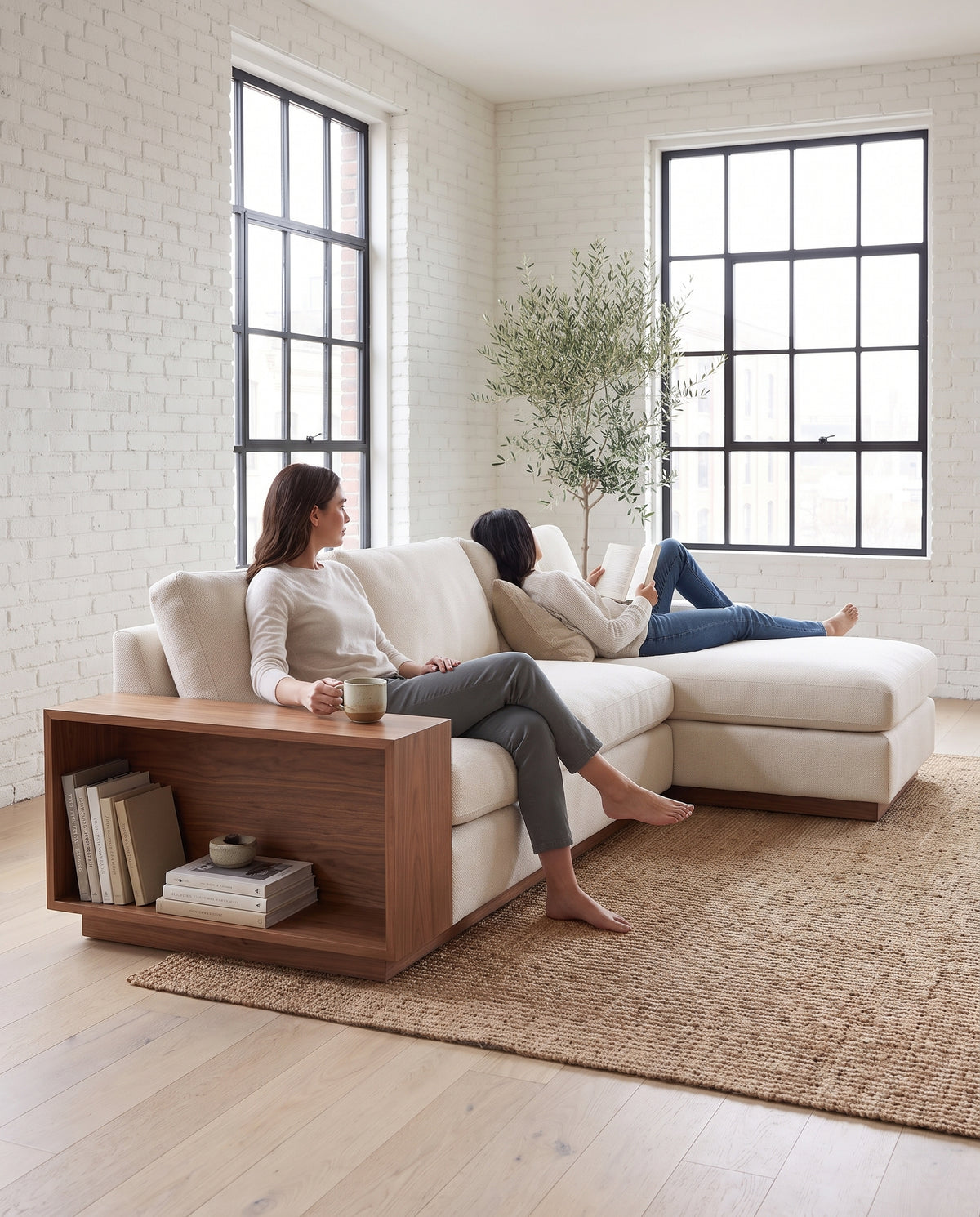 Biarritz Ivory Low Chaise Sectional with Walnut Side Table in everyday use at home
