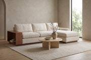 Biarritz Ivory Low Chaise Sectional with Walnut Side Table in a living space