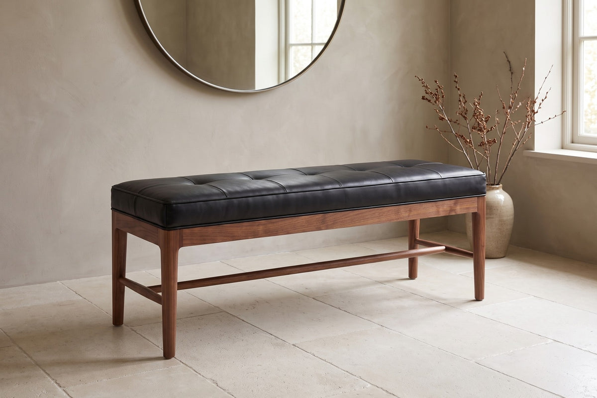 Carnac Leather and Walnut Bench in Black, in a room setting
