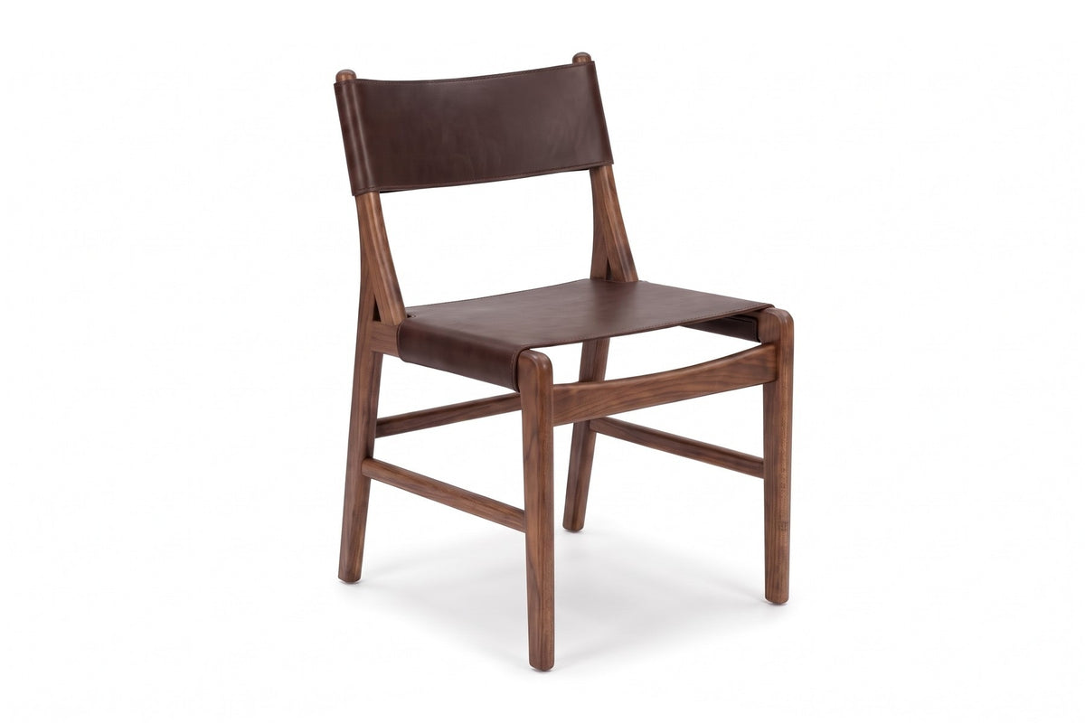 Cassis Leather Sling Dining Chair in Chocolate / Walnut, three-quarter view on white