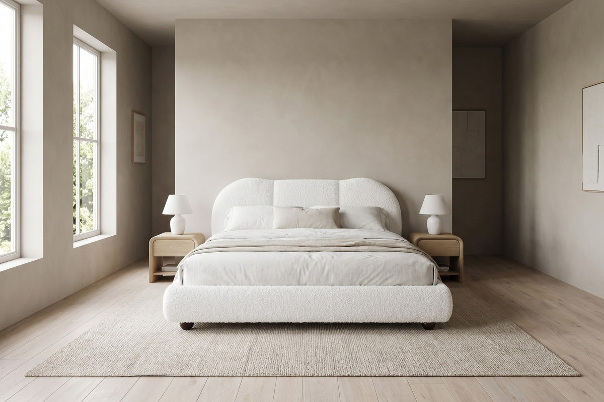 Head-on, the three channels and scalloped top sit centred between two lamps.