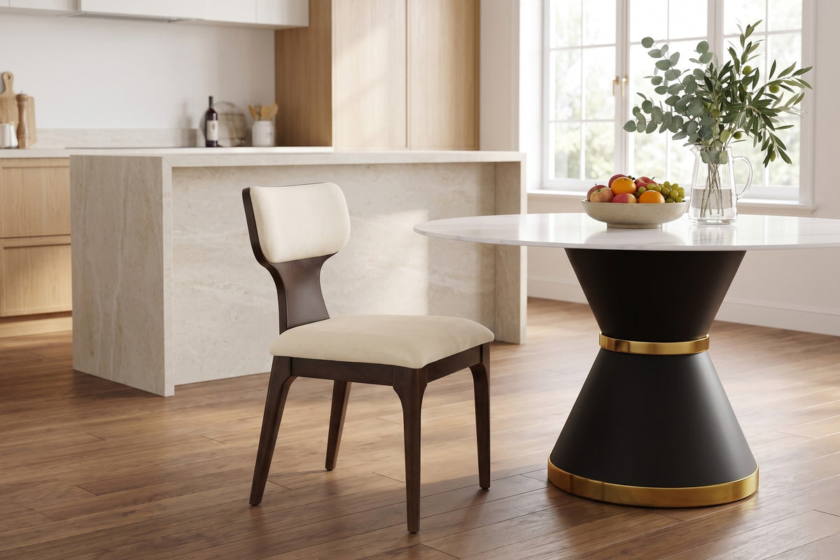 Daylight in the kitchen. Slim tapered legs keep the chair light beside a round table.