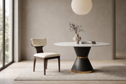 Colette chenille dining chair at the round white Orsay table in a calm daylit dining room