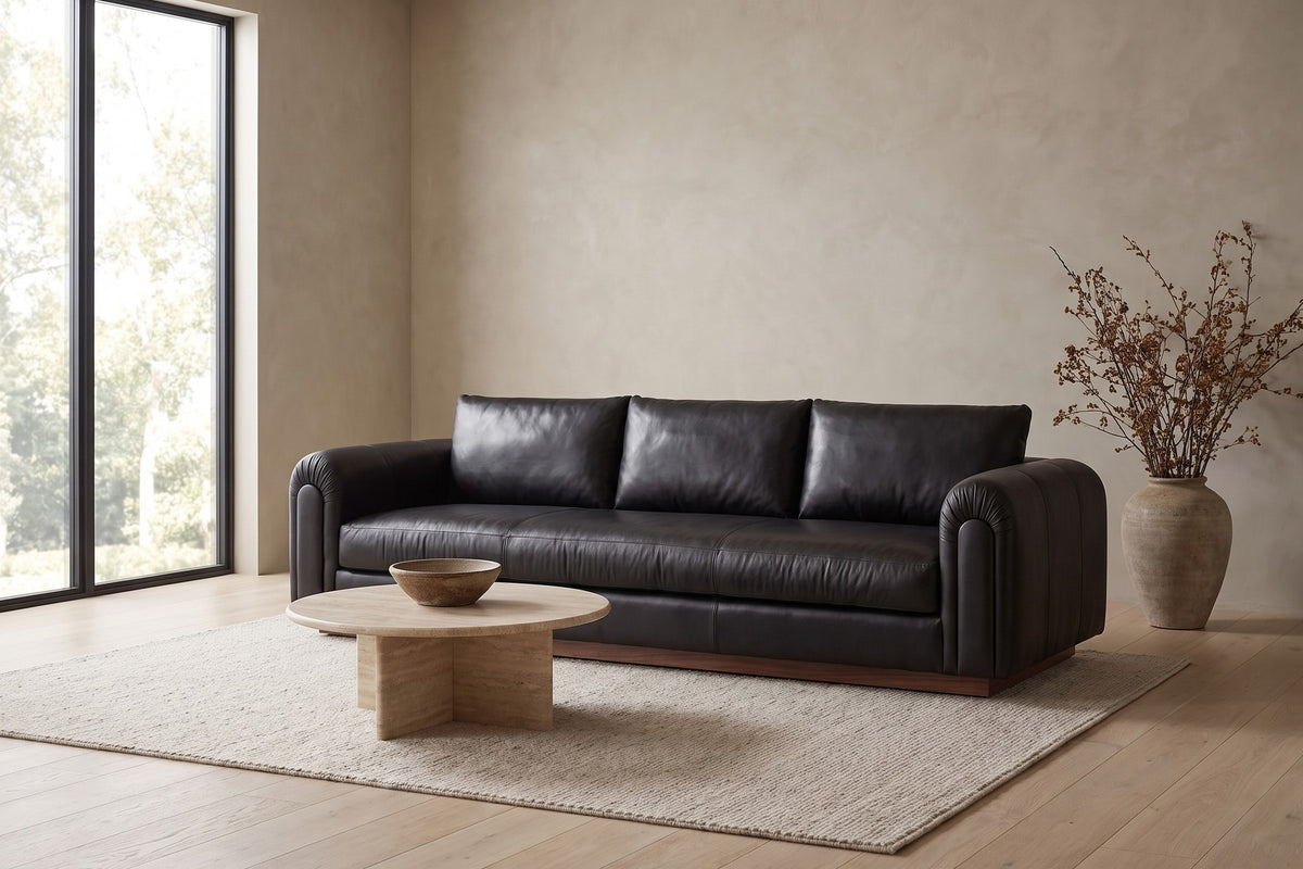 Collioure Leather Low Sofa in Black, in a living space