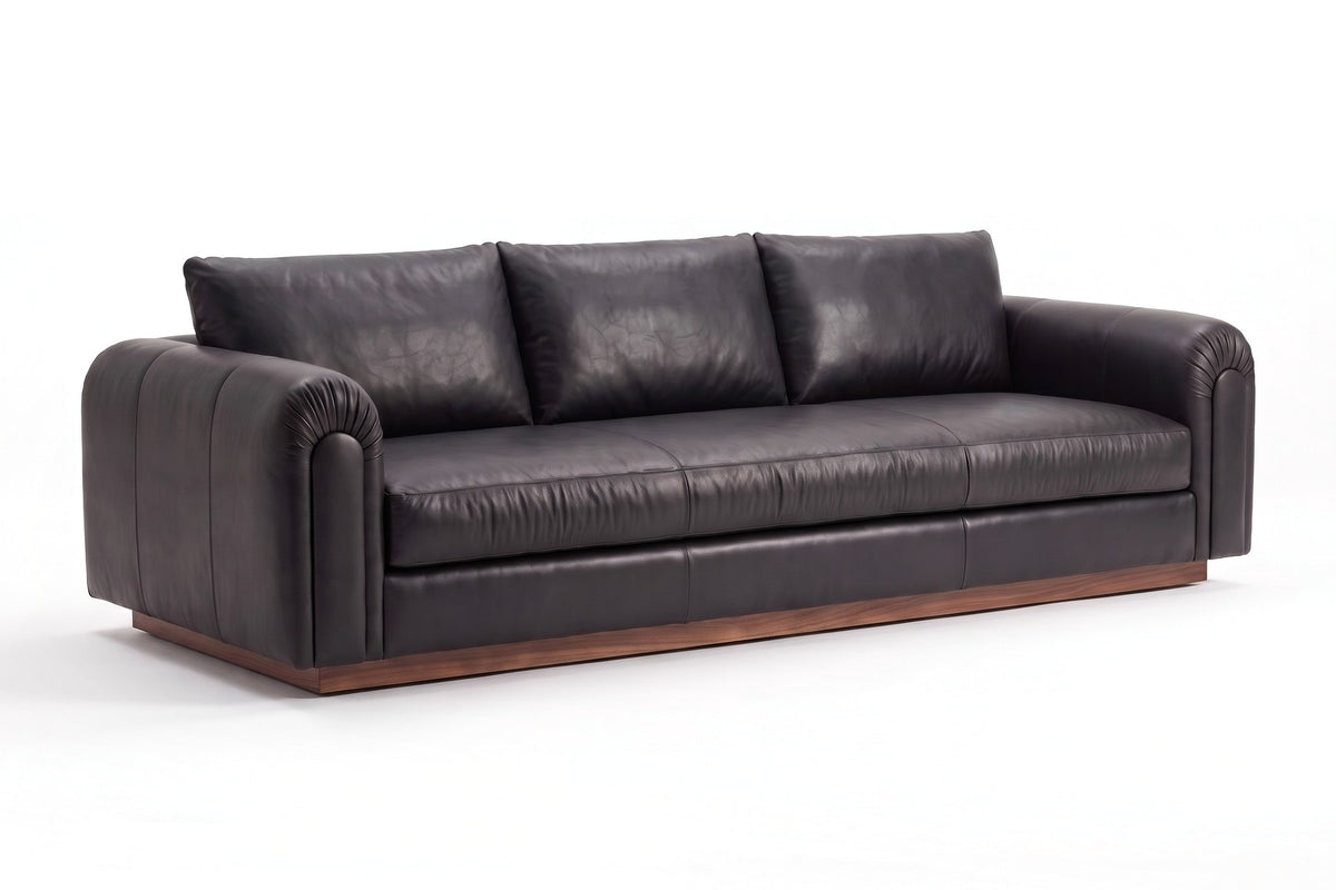 Collioure Leather Low Sofa in Black, three-quarter view on white