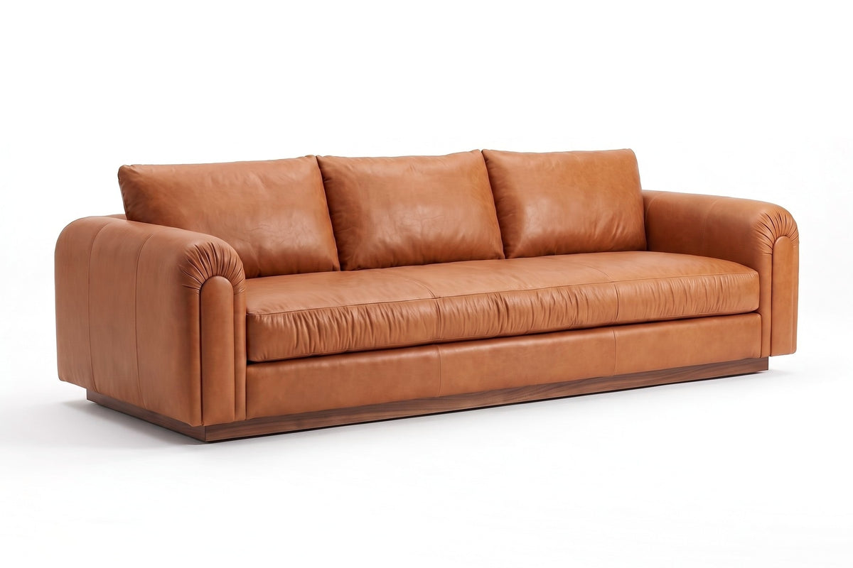 Collioure Cognac Leather Low Sofa, three-quarter view from the front left, slightly above seat height