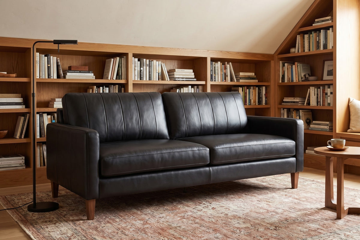 Colmar Leather Sofa in Black, in a living space