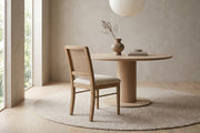 Daumesnil cane-back dining chair in sand-wash wood, set of 2 in a calm, daylit dining room