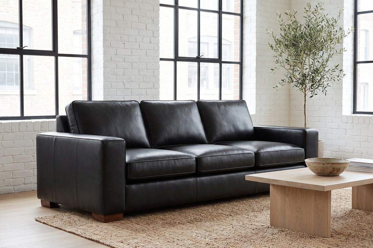 Deauville Leather Sofa in Black, in a room setting