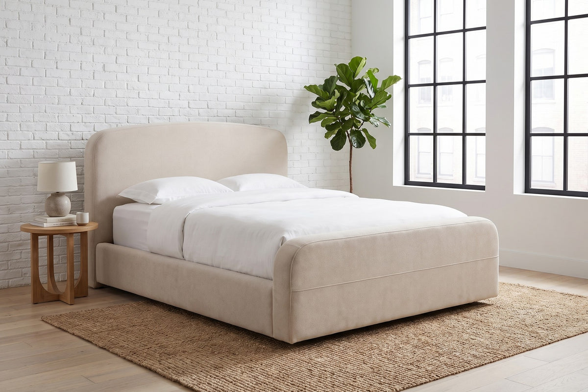 Giverny Oatmeal Upholstered Low Bed in a room