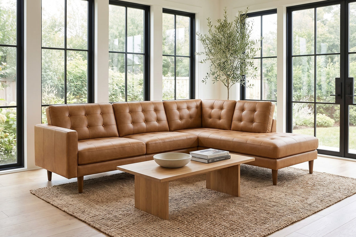 Daylight. By tall garden windows, the long chaise leaves room to stretch out.