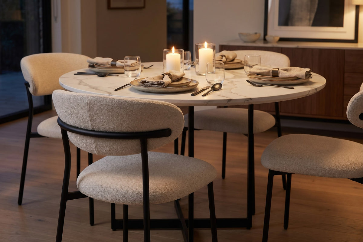 Héloïse beige chenille curved-back dining chair on black metal legs, set of 2 in a dining room set for dinner by candlelight