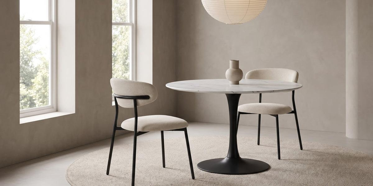 Héloïse beige chenille curved-back dining chair on black metal legs, set of 2 in a wide room view