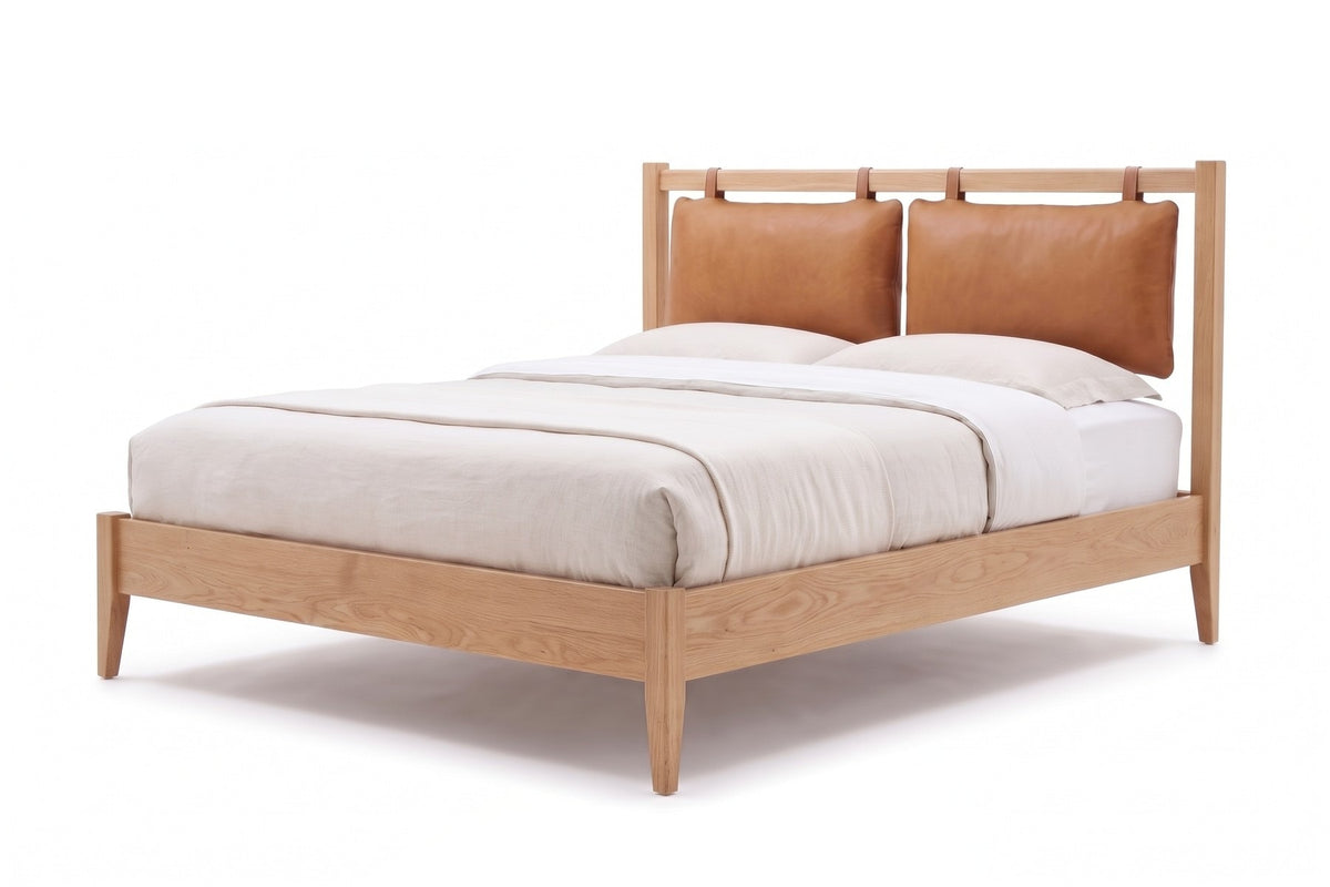 Honfleur Bed with Leather Cushions in Cognac / Natural Oak, three-quarter view on white