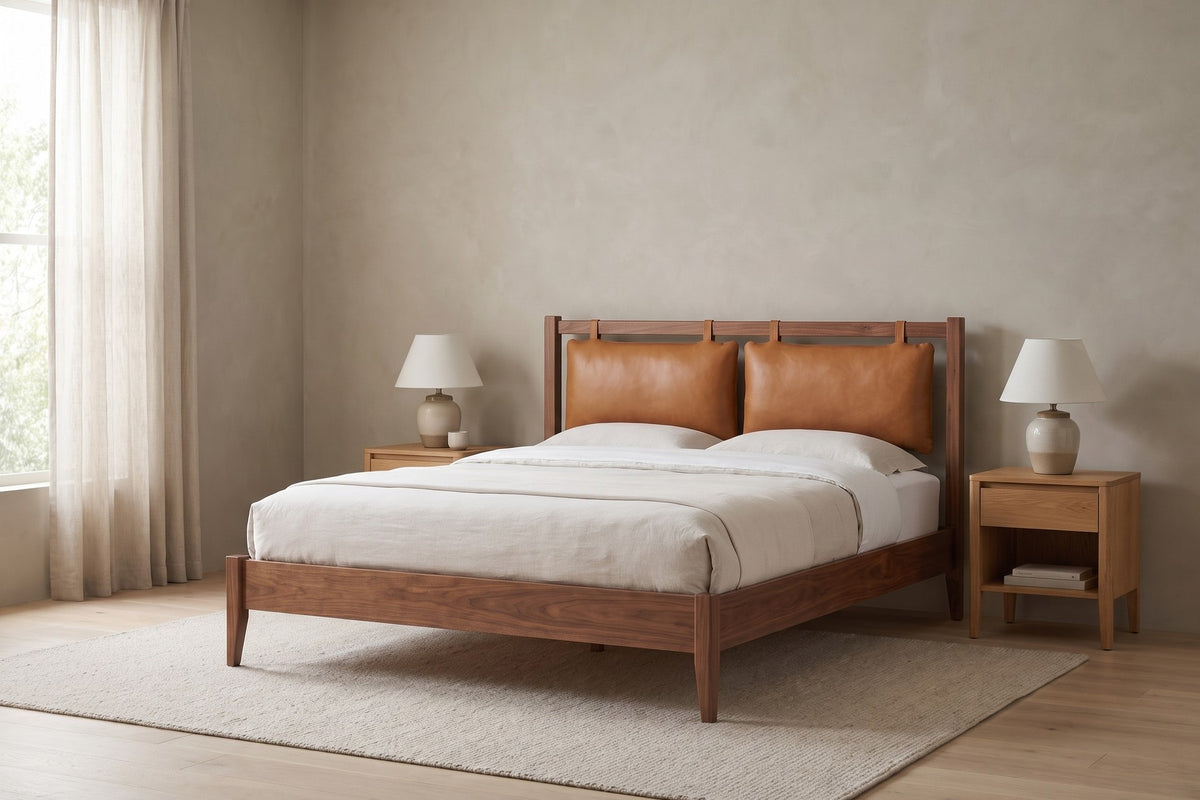Honfleur Walnut Bed with Cognac Leather Cushions in a home