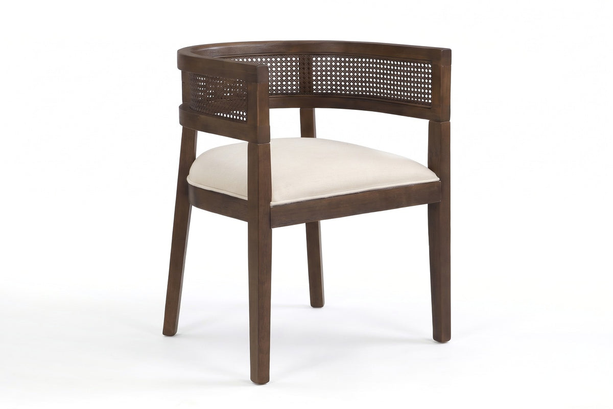 Ines cane barrel dining chair with a walnut-finish frame and beige seat, three-quarter front view on a white background