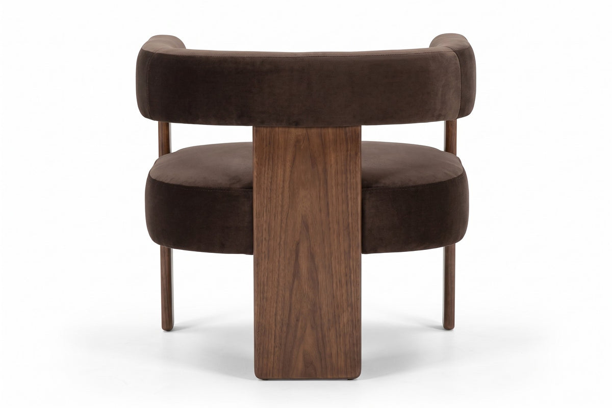 Juliette dark brown velvet barrel accent chair with a walnut-finish frame, back view on a white background