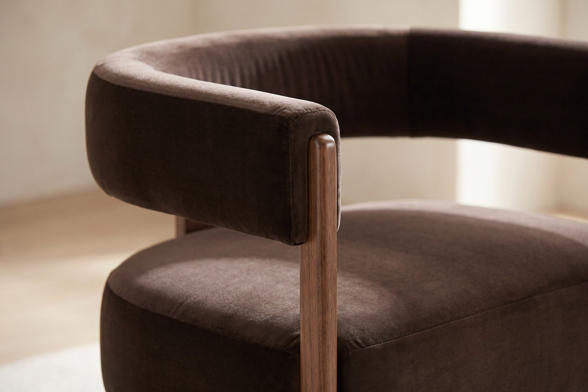 Close-up of the dark brown velvet band curving from the back into the arm (Juliette)
