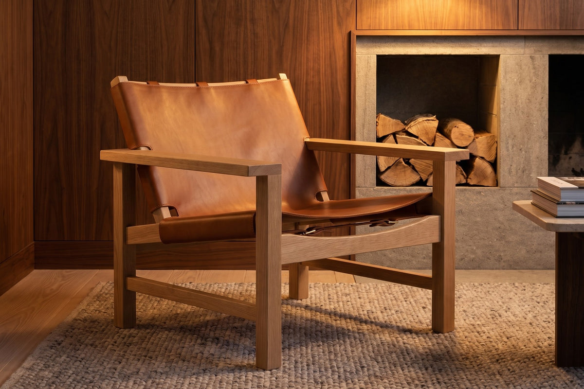Lourmarin Cognac Leather Sling Chair on Natural Oak in a home