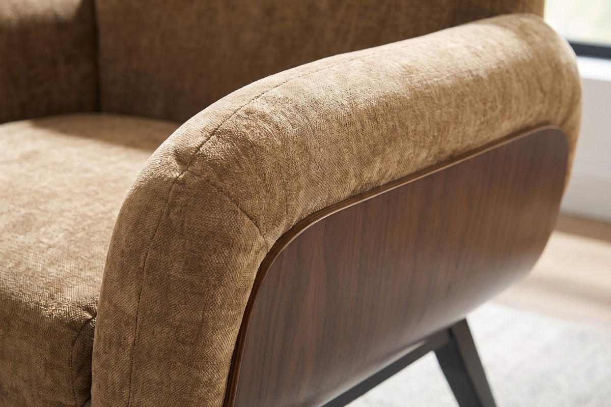 Close-up of the tan fabric texture on the rounded arm (Lucie)