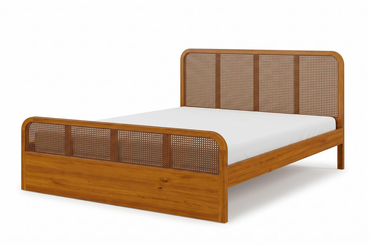 Malo walnut-finish solid wood platform bed with cane panels, low three-quarter view from beside the foot of the bed, showing the panel footboard, one side rail and the headboard on a white background