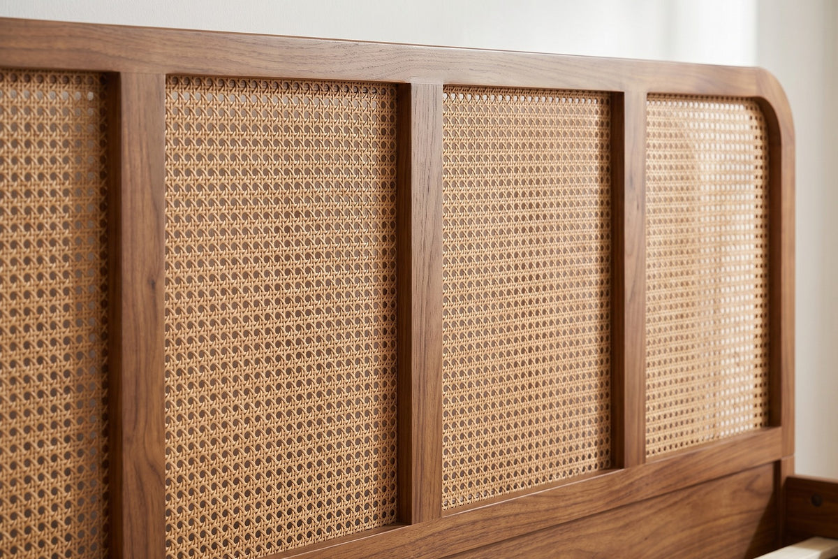 Close-up of the cane panels in the headboard, divided by walnut-finish wood uprights (Malo)