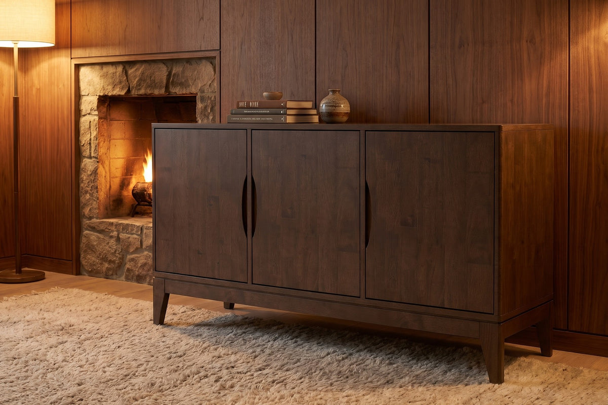 Evening. By a stone fireplace, the walnut-brown finish turns rich and warm.