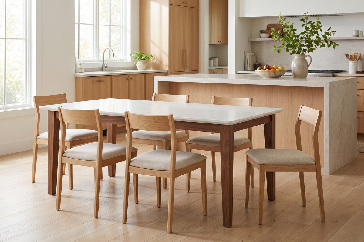 Ménerbes White Quartz and Walnut Dining Table styled in a room