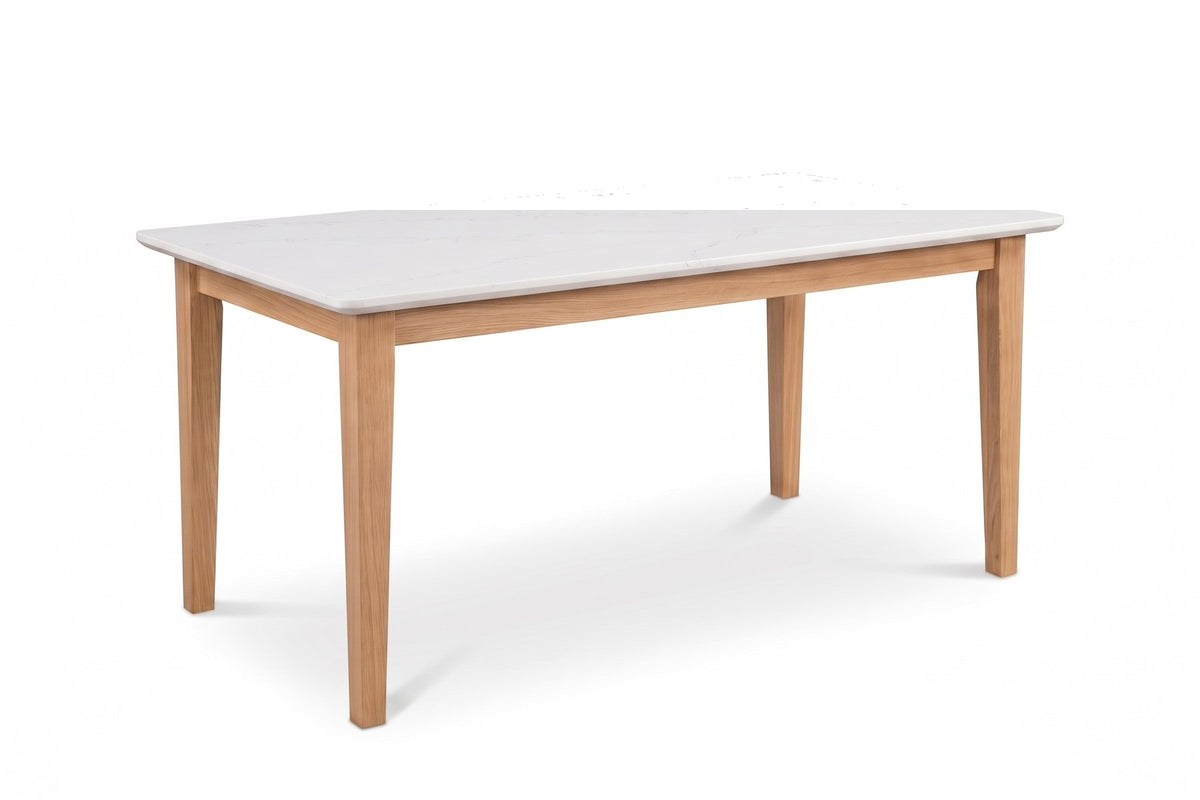 Ménerbes White Quartz Dining Table in Natural Oak, three-quarter view on white