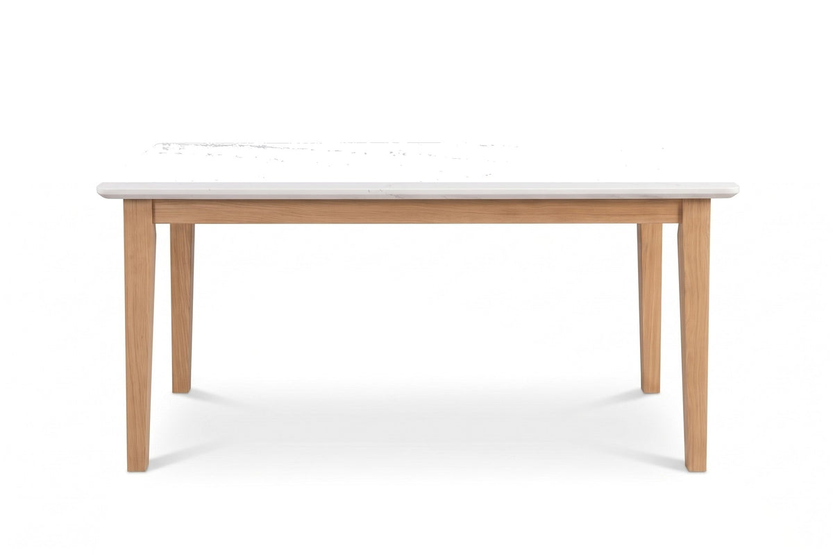 Ménerbes White Quartz Dining Table in Natural Oak, front view on white