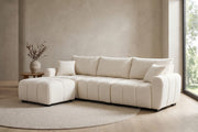 Montmartre 110" cream boucle modular sectional with movable ottoman in a calm, daylit living room