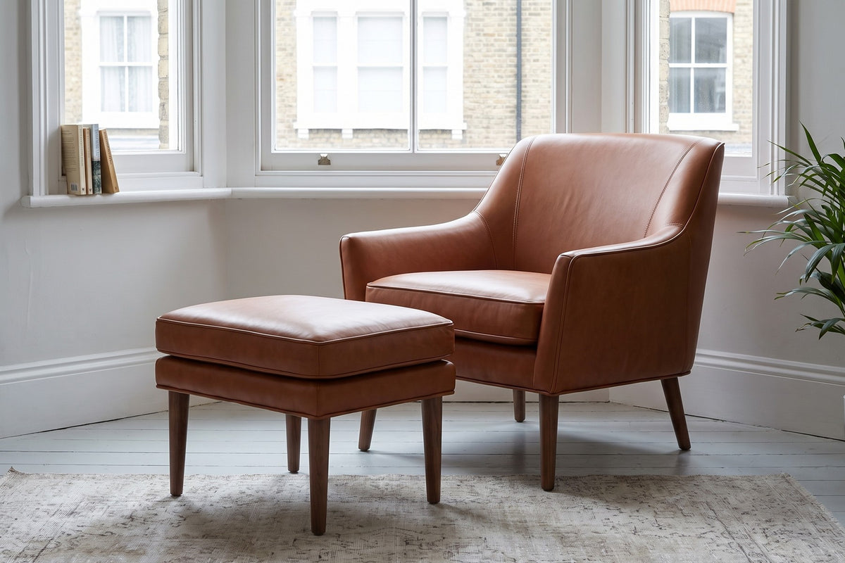 Nyons Leather Armchair & Ottoman – Mid-Century Curved Back, Tapered Walnut Legs