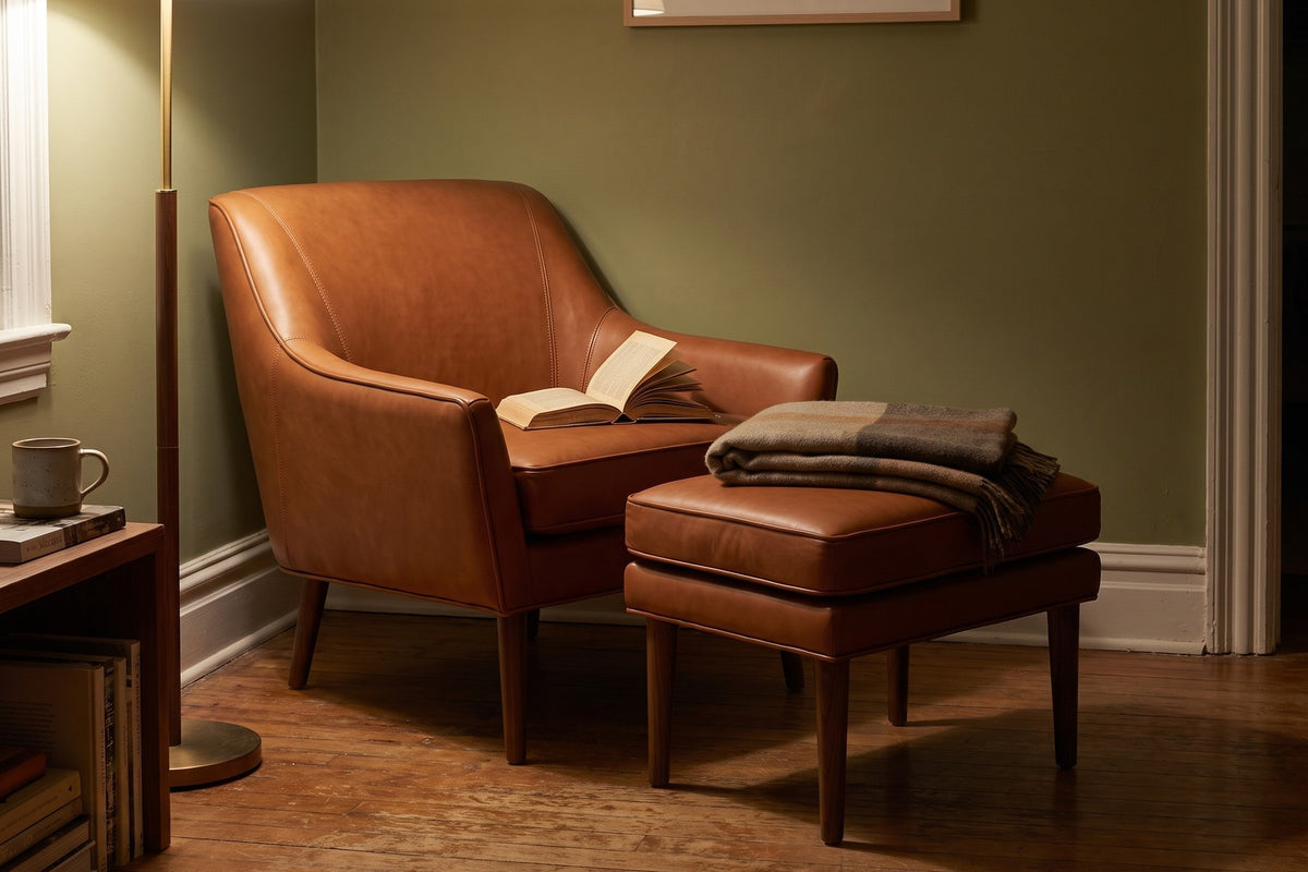 Nyons Leather Armchair & Ottoman – Mid-Century Curved Back, Tapered Walnut Legs
