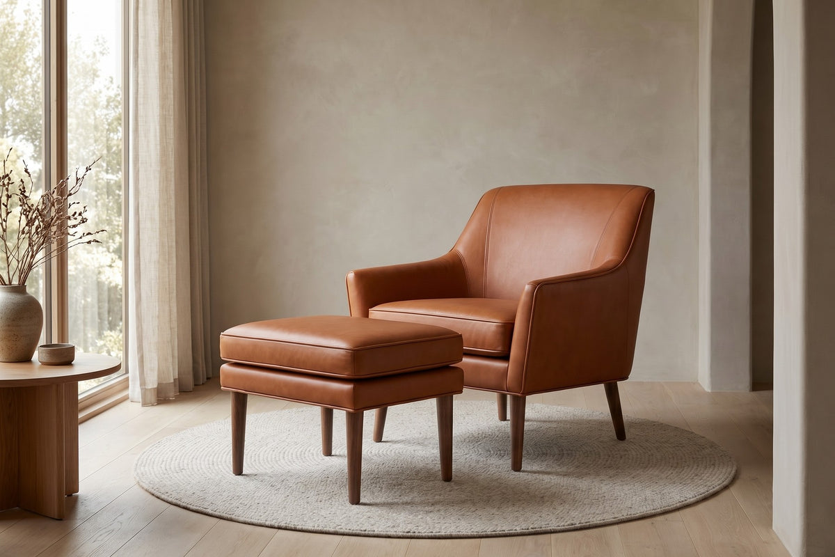 Nyons Leather Armchair & Ottoman – Mid-Century Curved Back, Tapered Walnut Legs