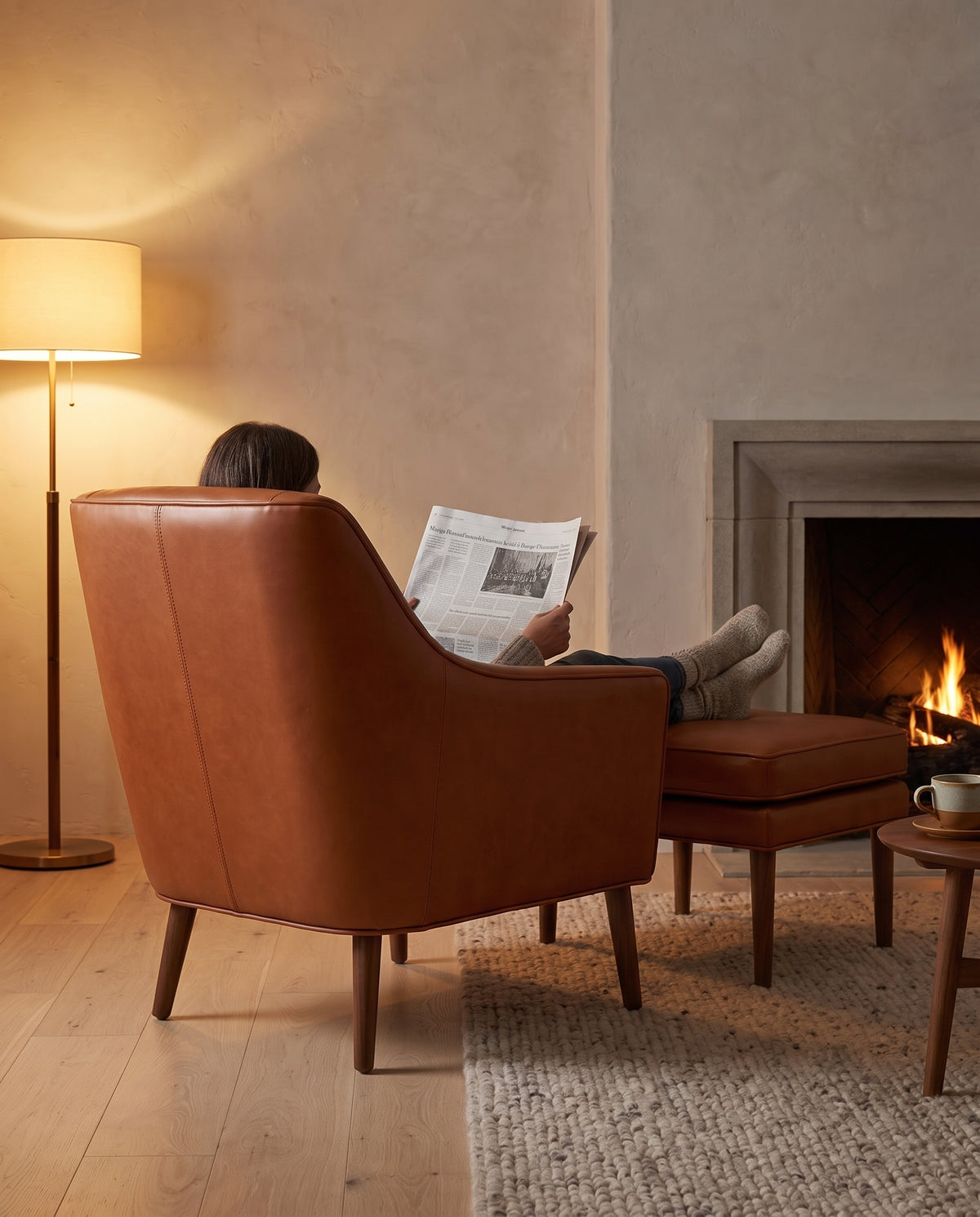 Nyons Cognac Leather Armchair and Ottoman in everyday use at home